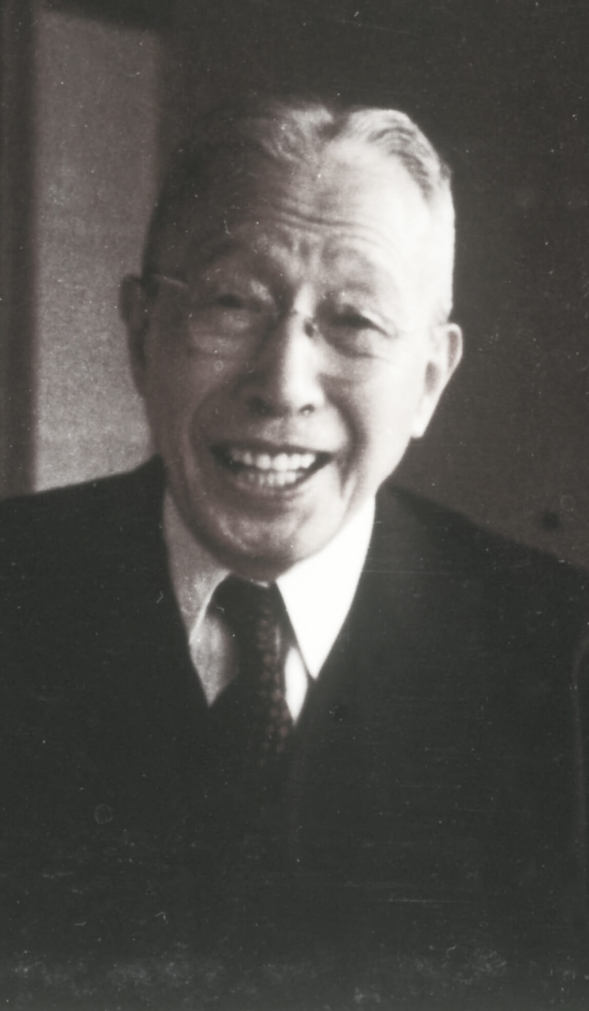 Black-and-white photo of Suntory founder Shinjiro Torii