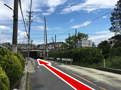 A railroad track will be visible in the front.
