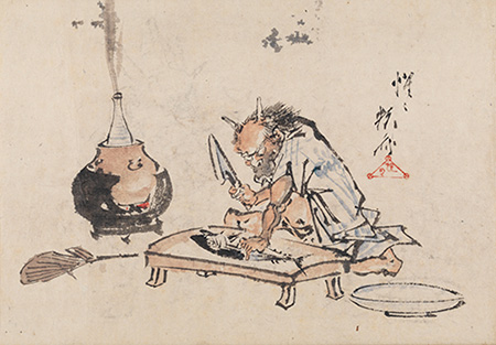 酒のツマミに鰹を準備する鬼